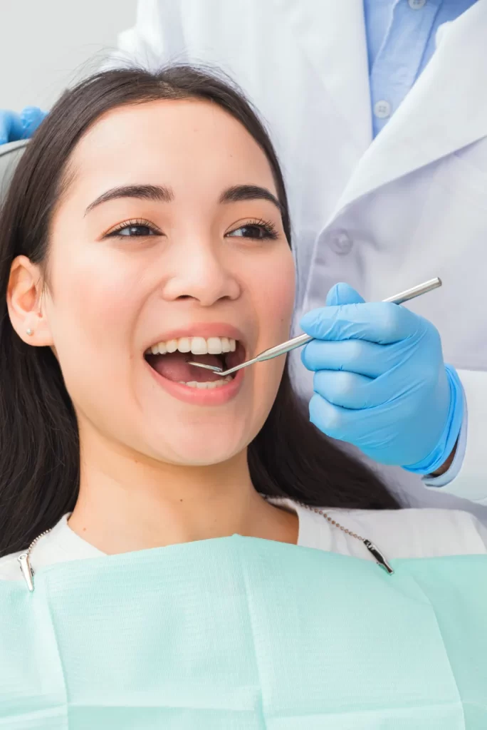 Smiling woman at the dentist